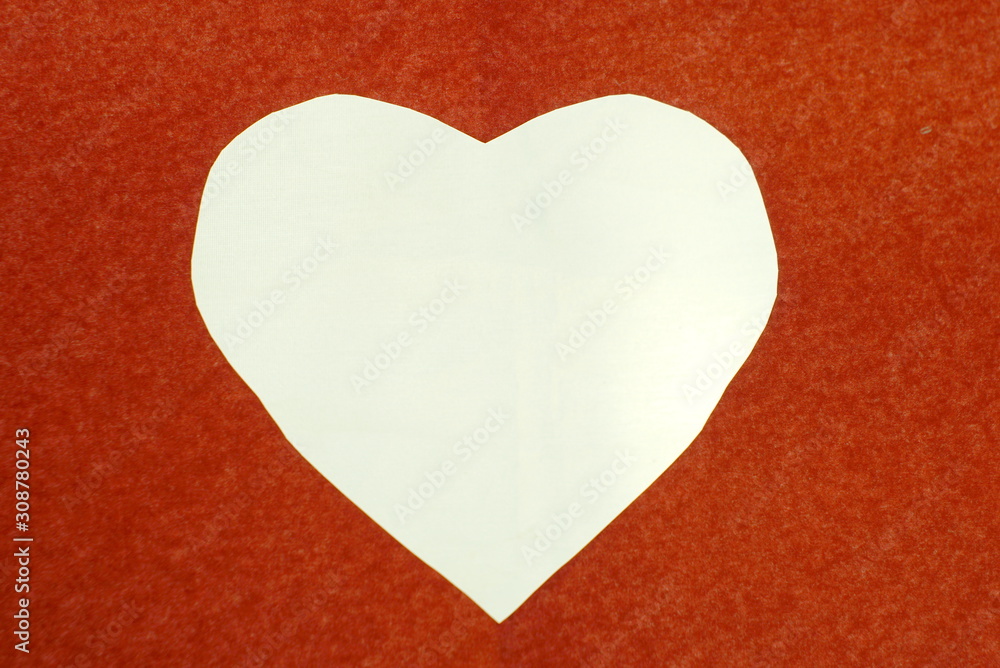 Fototapeta premium white heart cut into paper