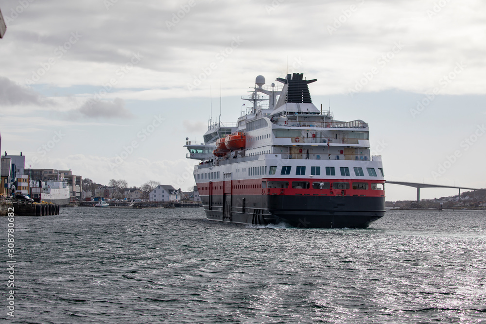 Coastal ships departure from Bronnoysund harbor, Northern Norway