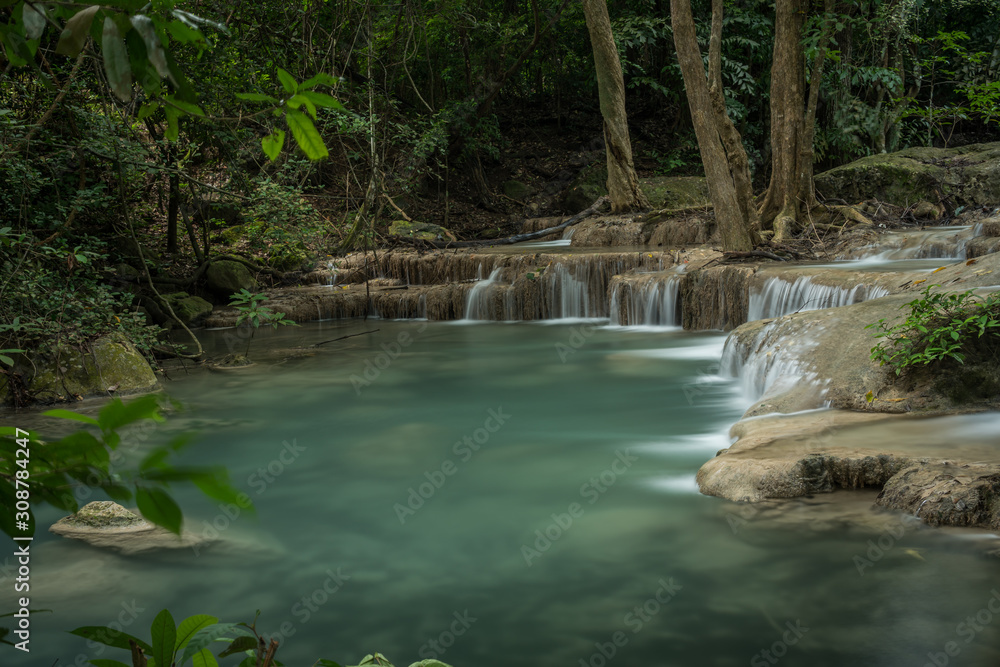 Naklejka premium Kanchanaburi Jungle Waterfalls and Pristine Phuket Beaches