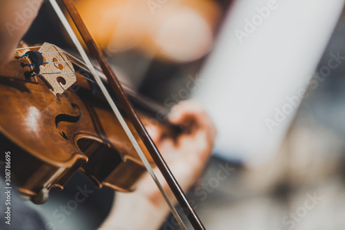 Fotografia Side views of classical instruments - violin, double basses, cellos, closeup of