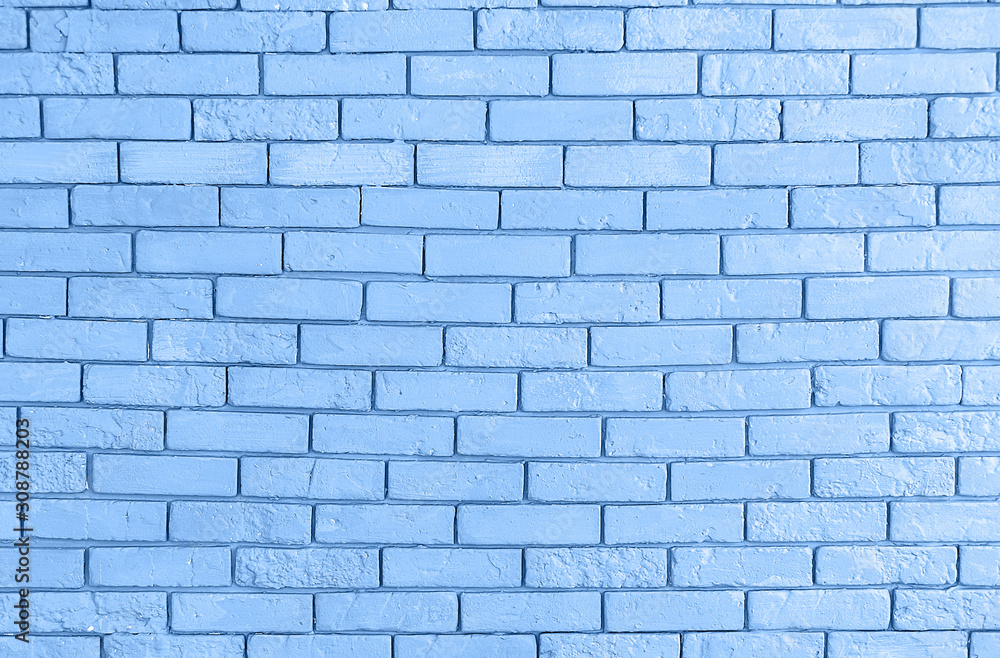 Obraz premium Grunge brick wall texture, copy space. Classic blue background. Color of the year 2020. Top view, flat lay