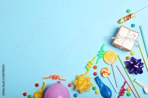 Fototapeta Naklejka Na Ścianę i Meble -  Flatlay composition with accessories for a party or birthday on a colored background with place for text top view.