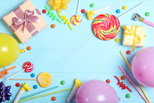Flatlay composition with accessories for a party or birthday on a colored background with place for text top view.