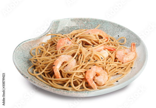 Plate of tasty buckwheat noodles with shrimps on white background