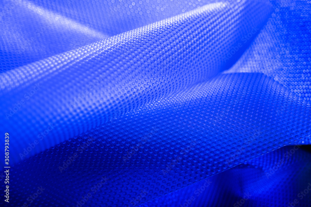 Naklejka premium Plastic in blue color. Environmental protection. Utilization of wastes.
