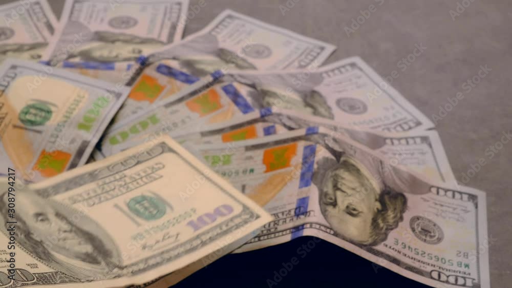 USD 100 dollars too much standing on a black background, world currency dollars, USD 100 dollars too much standing on a black background, world currency dollars,