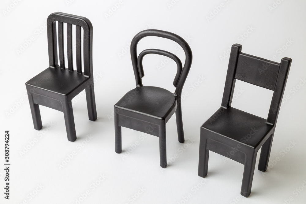 Obraz premium Close up of vintage chairs composition isolated on white.