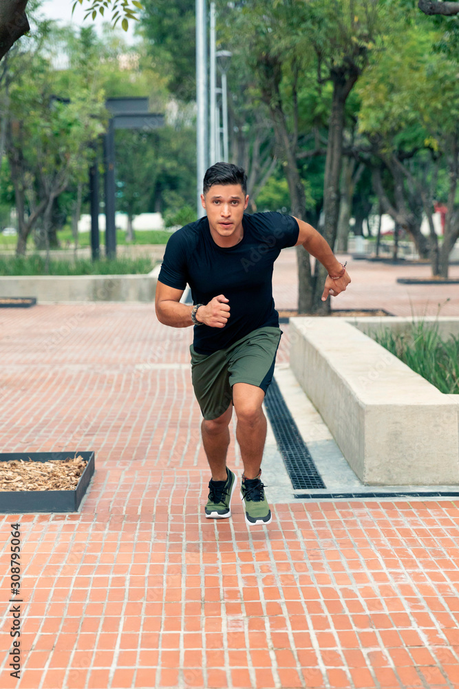 Young man exercising outdoors.