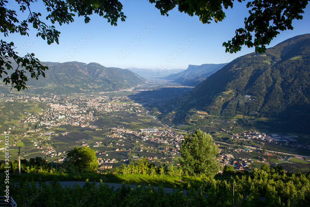 Beautiful June weather in Northern Italy with a spectaculor view of the city of Meran and its surrounding region