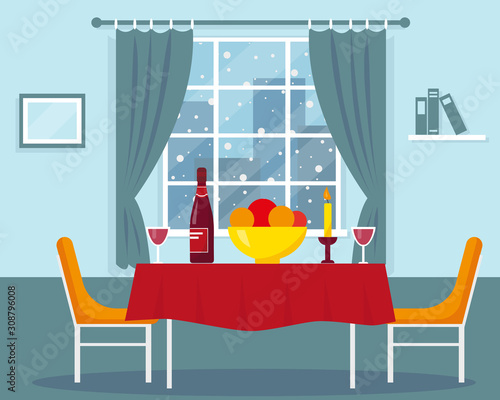 Dining table for romantic dinner near the window.