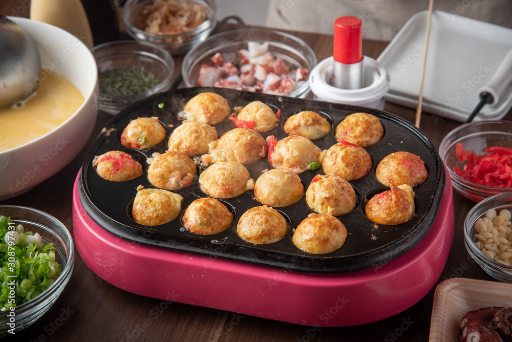 cooking home style takoyaki, japanese octopus balls cooking home style takoyaki, japanese octopus balls