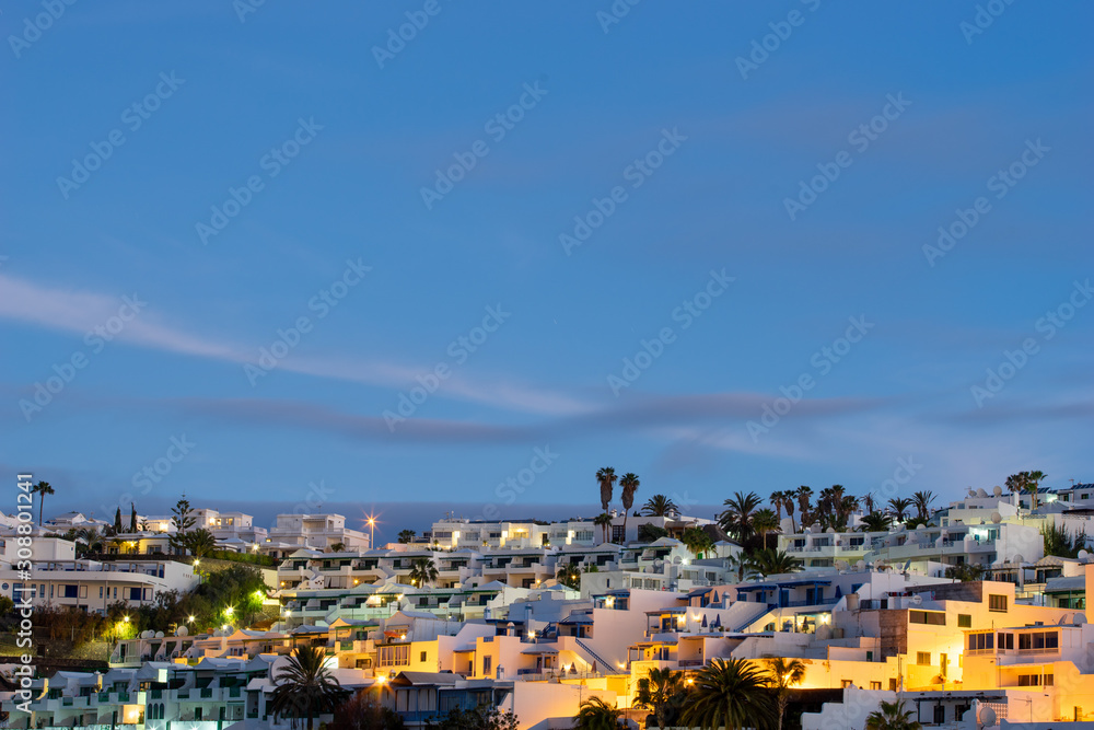 lanzarote village at dusk with empty space at the top