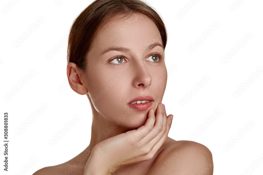 Beautiful young woman with clean fresh skin. Face treatment. Cosmetology, beauty and spa. Natural clear skin, close-up face Beautiful young woman with clean fresh skin. Face treatment. Cosmetology, beauty and spa. Natural clear skin, close-up face