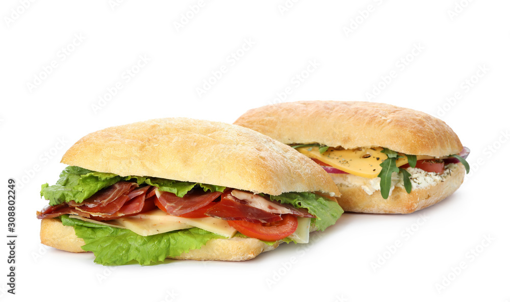 Delicious sandwiches with fresh vegetables isolated on white Delicious sandwiches with fresh vegetables isolated on white
