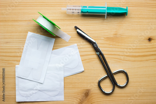 medical utensils on a wooden background