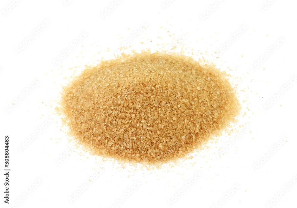 Closeup pile brown sugar isolated on white background. Closeup pile brown sugar isolated on white background.