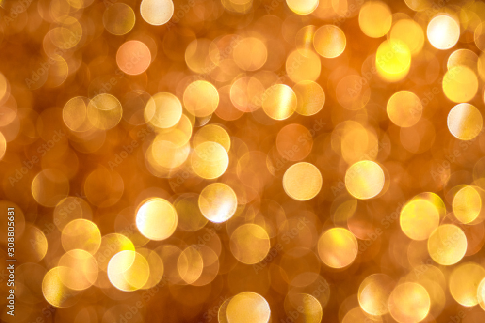 Festive golden and orange background with bright bokeh_ Festive golden and orange background with bright bokeh_