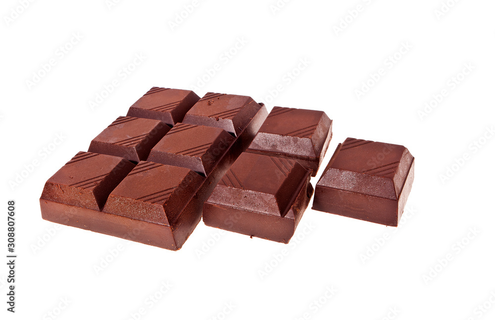Chopped chocolate bar isolated on white background