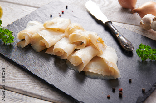 Fotografie Delicious smoked halibut slices close up
