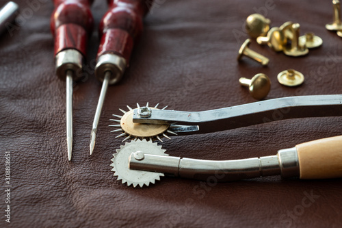 Leather craft roller markers, copper studs and puncturing tools. Leather working tools