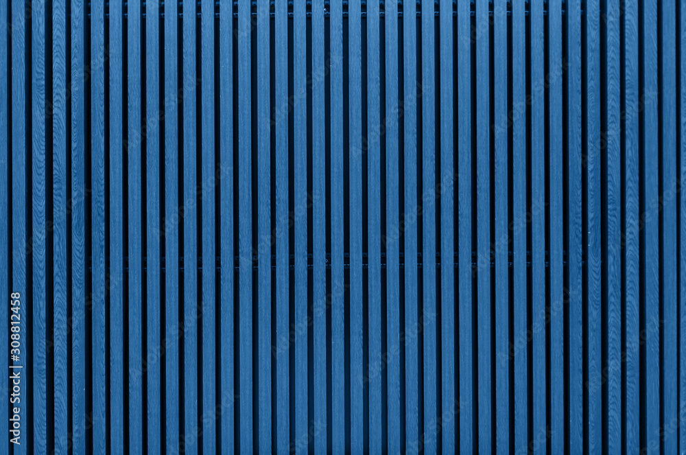 Color of the year 2020 classic blue. Wooden background painted in modern color trend Color of the year 2020 classic blue. Wooden background painted in modern color trend