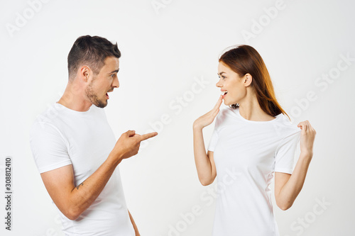 young couple in t-shirts chatting © SHOTPRIME STUDIO