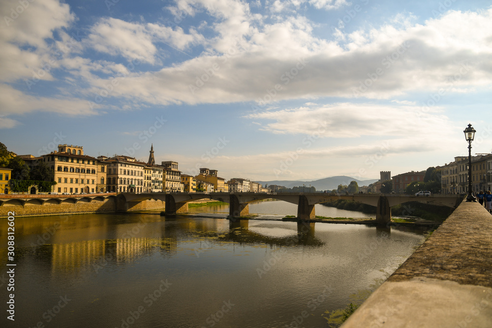 Scenic view of the Arno River with the Ponte alle Grazie bridge in the historic centre of Florence, Unesco World Heritage Site, at sunset, Tuscany, Italy