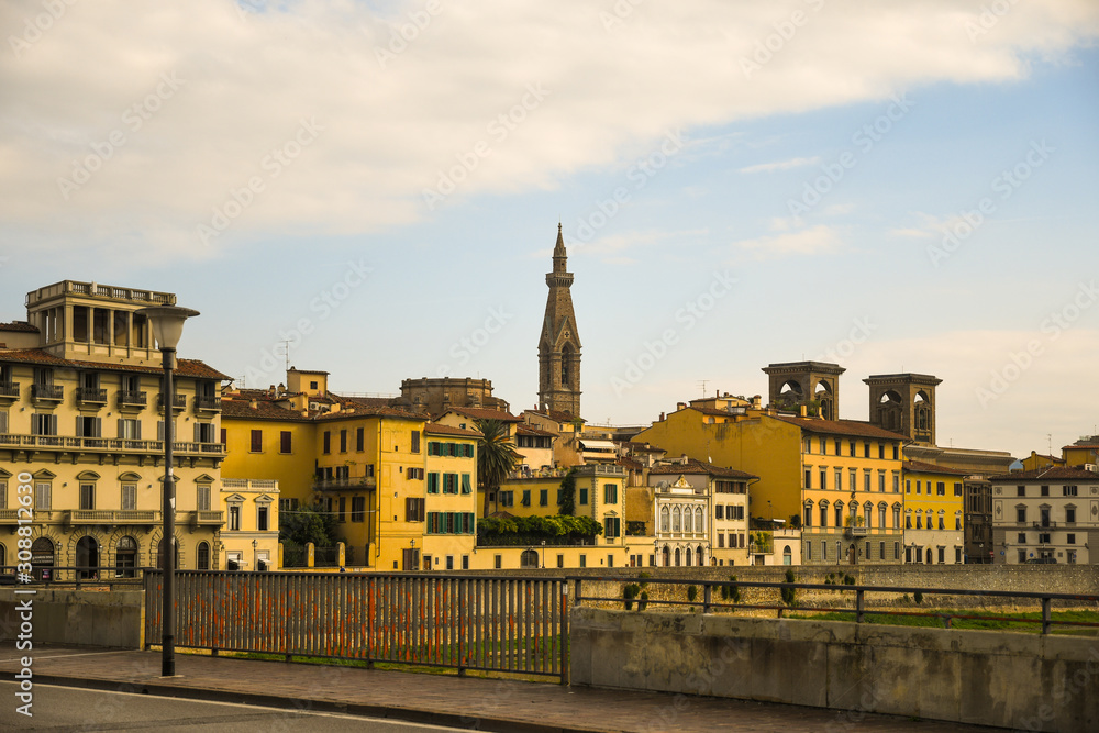 View of the historic centre of Florence, Unesco World Heritage Site, from Ponte alle Grazie bridge with Lungarno delle Grazie riverside and the bell tower of Basilica of Santa Croce, Tuscany, Italy