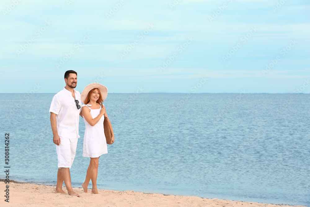 Happy couple at sea resort Happy couple at sea resort