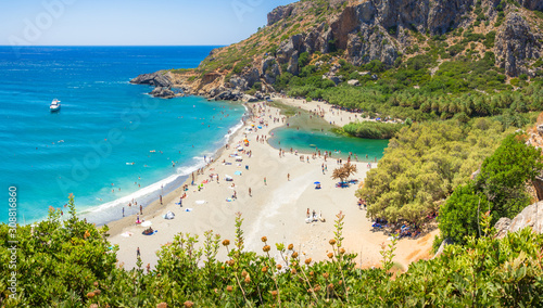 Fototapeta Naklejka Na Ścianę i Meble -  Panorama of Preveli beach at Libyan sea, river and palm forest, southern Crete , Greece