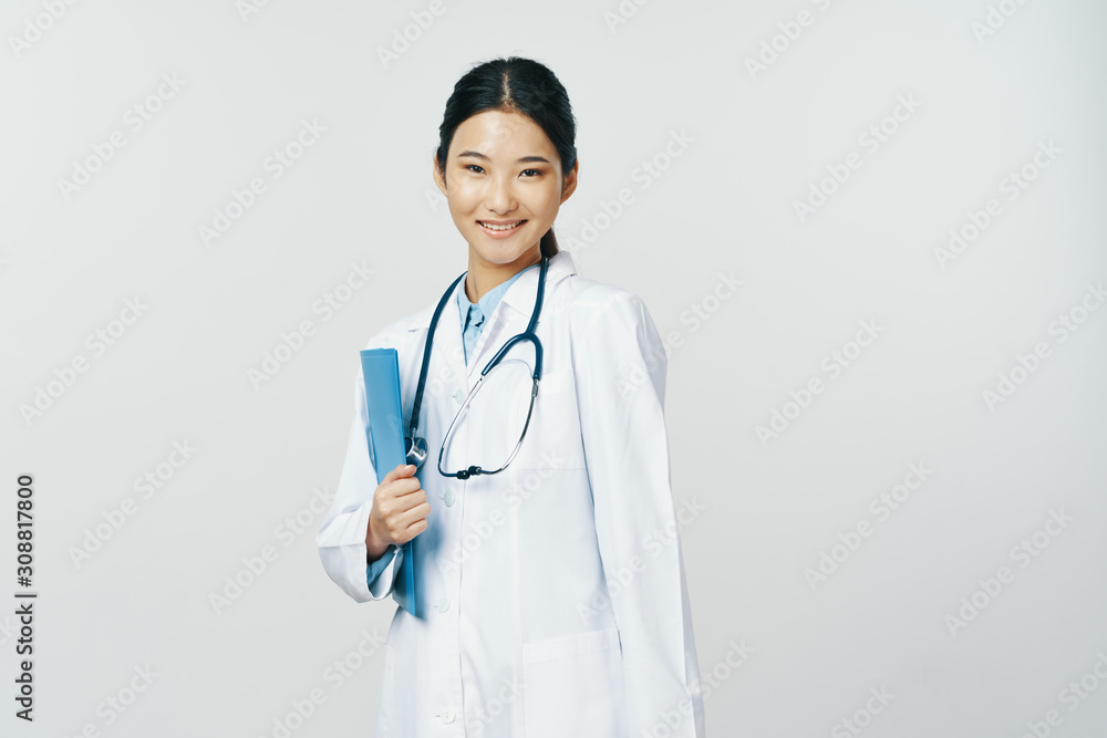 portrait of a female doctor with stethoscope portrait of a female doctor with stethoscope
