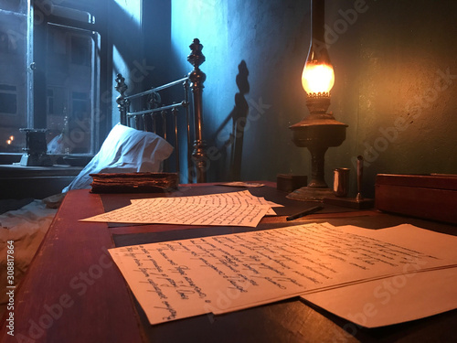 Принти на полотні manuscripts under the light of the 19th Century Antique kerosene lamp, a mysteri
