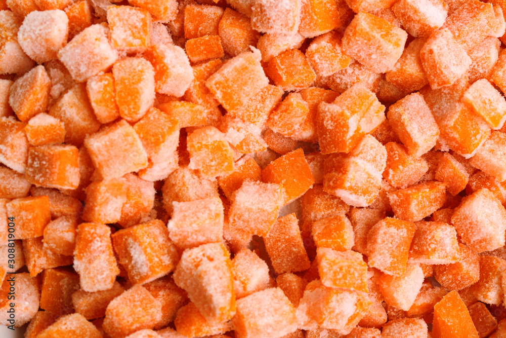Tasty frozen carrots as background, top view. Vegetable preservation Tasty frozen carrots as background, top view. Vegetable preservation