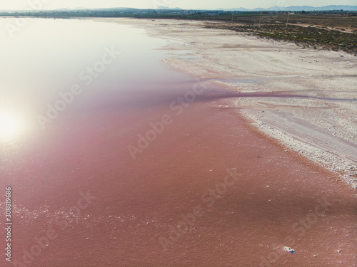 Beautiful aerial wide vibrant summer view of las Salinas de Torrevieja  The Pink Lake Of Torrevieja  pink salt lagoon in Torrevieja  Costa Blanca  province of Alicante  Spain