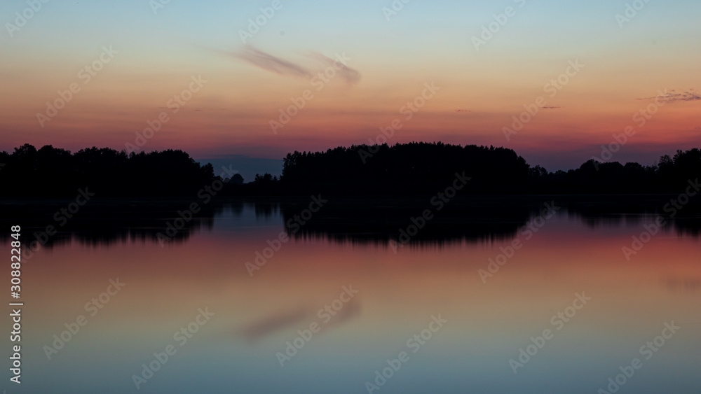 reflection of sunset over the lake