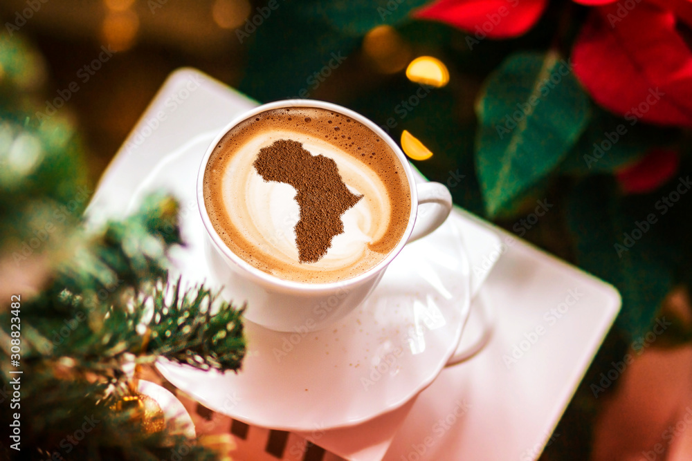 Cup of cappuccino with a picture of Africa Cup of cappuccino with a picture of Africa