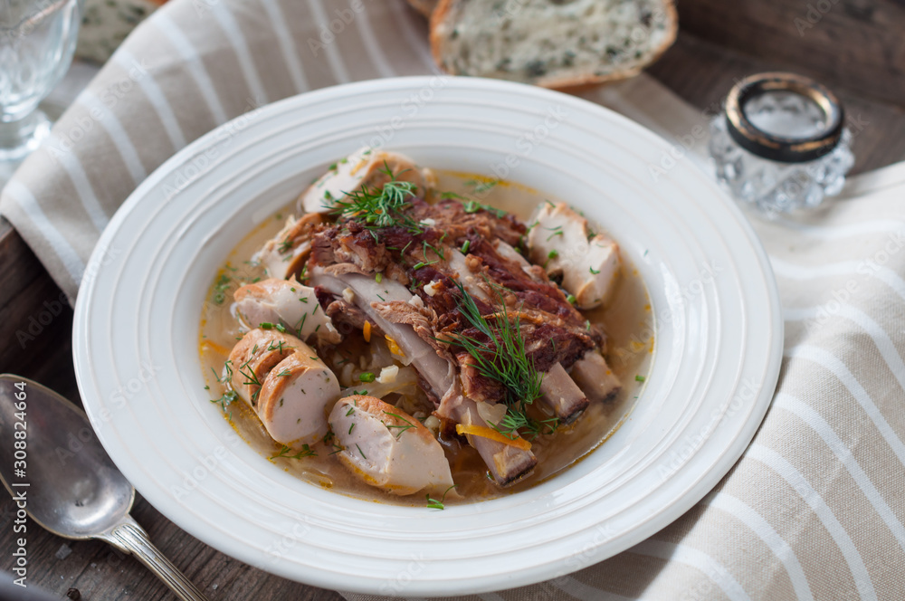 Cozy Winter Sauerkraut Soup with Smoked Pork Ribs and Sausage Cozy Winter Sauerkraut Soup with Smoked Pork Ribs and Sausage