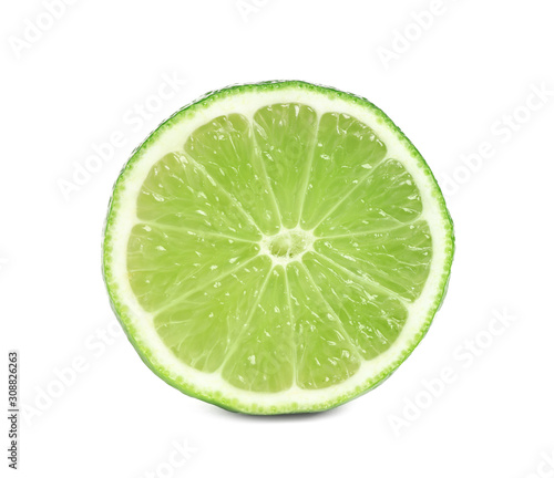 Cut fresh ripe lime isolated on white