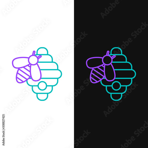 Green and purple line Hive for bees icon isolated on white and black background. Beehive symbol. Apiary and beekeeping. Sweet natural food. Vector Illustration