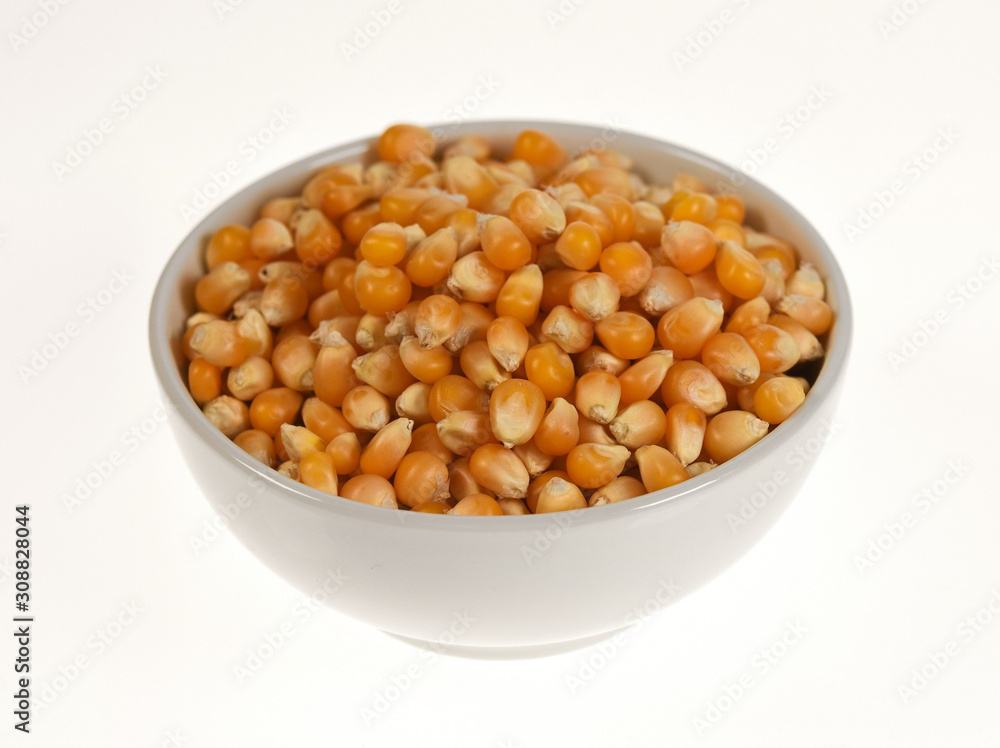 Popcorn in a bowl on white background Popcorn in a bowl on white background