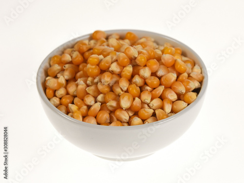 Popcorn in a bowl on white background