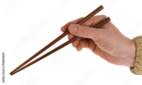 hand with chopsticks isolated on white