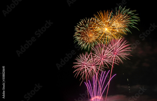 Fireworks in the Dark Sky Background