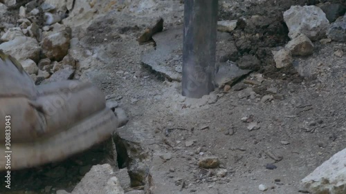 Wallpaper Mural Jackhammer breaks up a concrete floor - close-up4K Torontodigital.ca