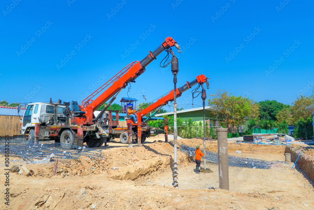 Drilling rigs for the construction of building foundations. construction work. Drilling pile foundations under the ground.