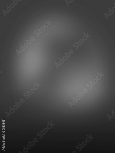 Blurred black and white background for studio photos. Studio portrait background. Different shades of gray.