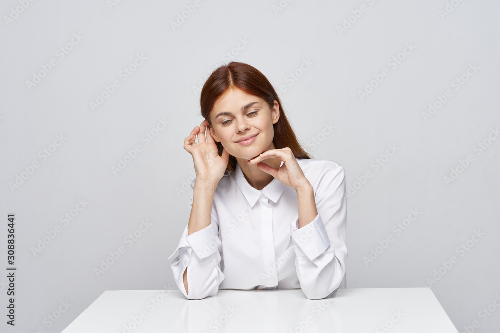 portrait of a young woman sitting on sofa portrait of a young woman sitting on sofa