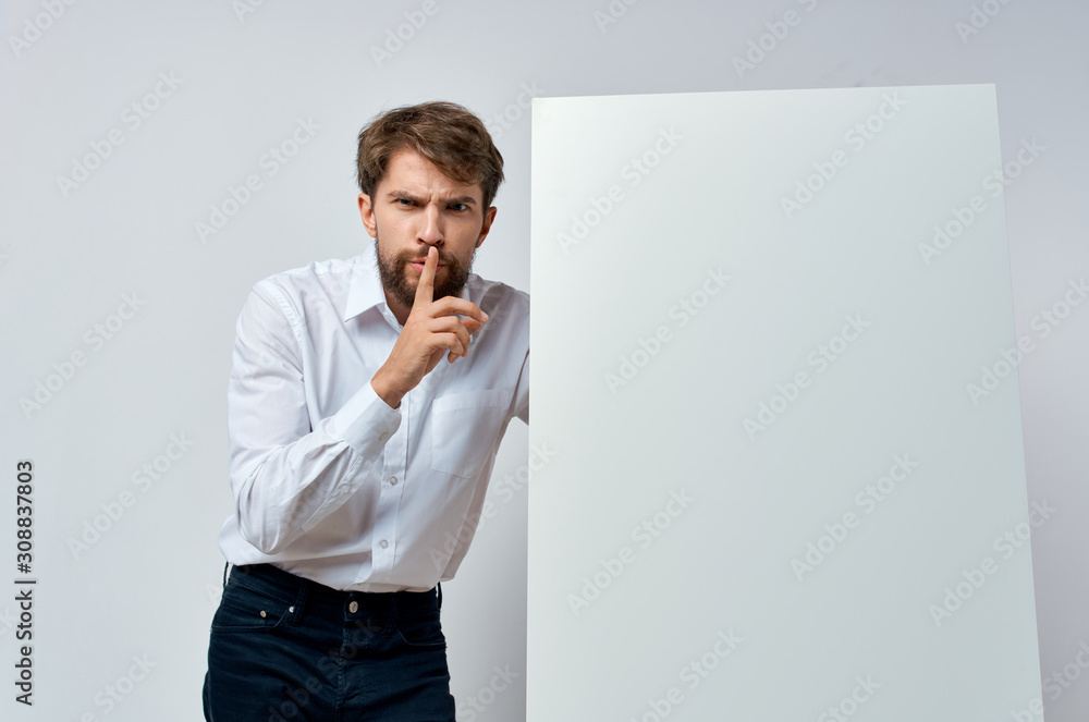 young man with blank board