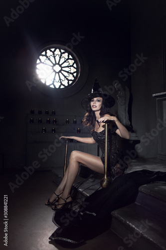 Sexy witch with long legs.