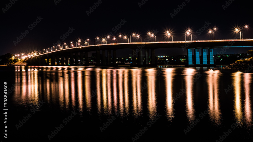 Bridge at night with reflections